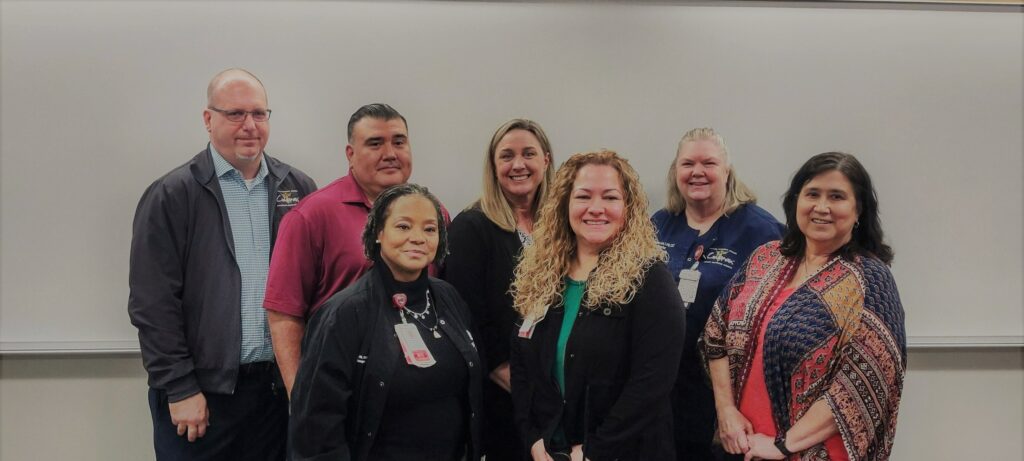 Smiling cohort of Houston Community College students eligible for Texas Children's Surgical Tech Entrance into Practice Program.